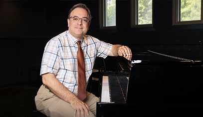 Borna Bonakdarpour at sitting at the piano