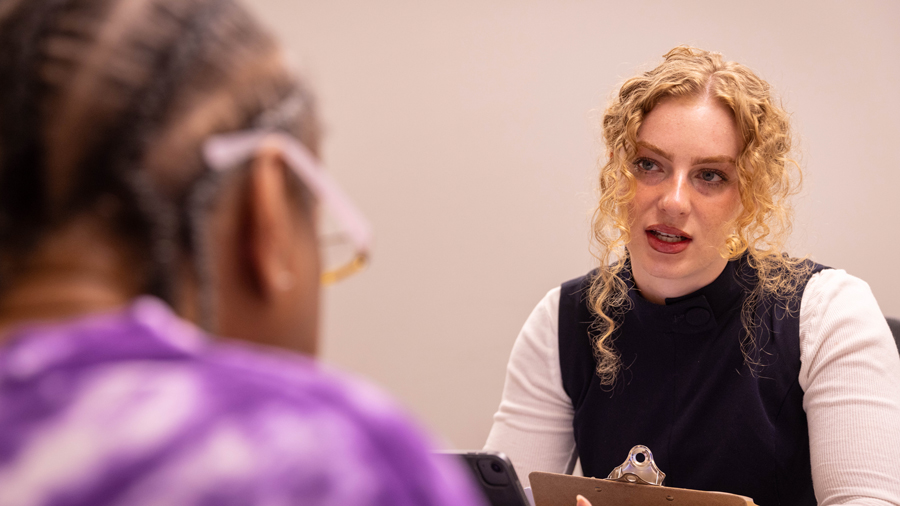 A Mesulam Center staff meets with a patient at the Memory Clinic